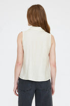 sleeveless blouse in off white