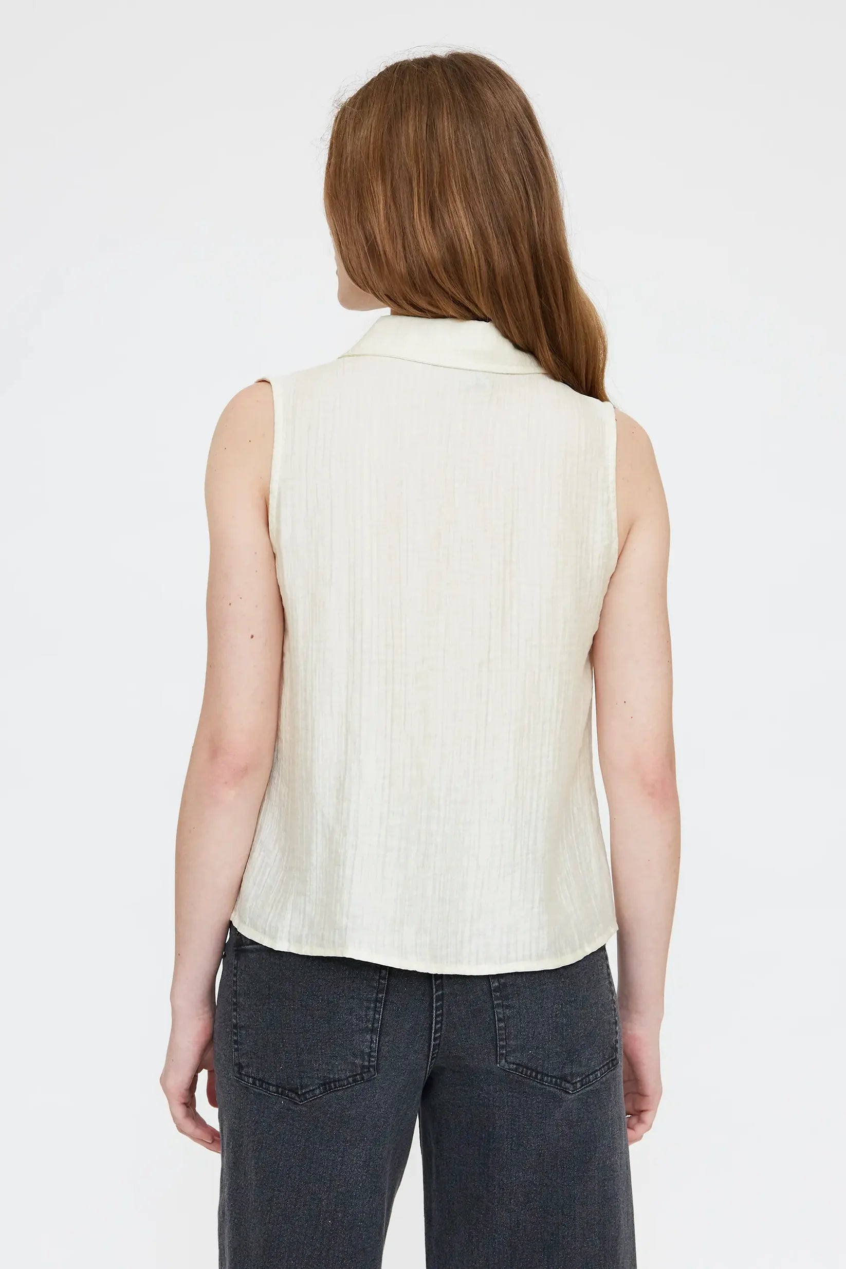 sleeveless blouse in off white