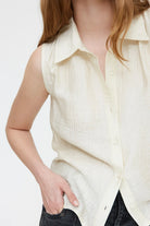 sleeveless blouse in off white