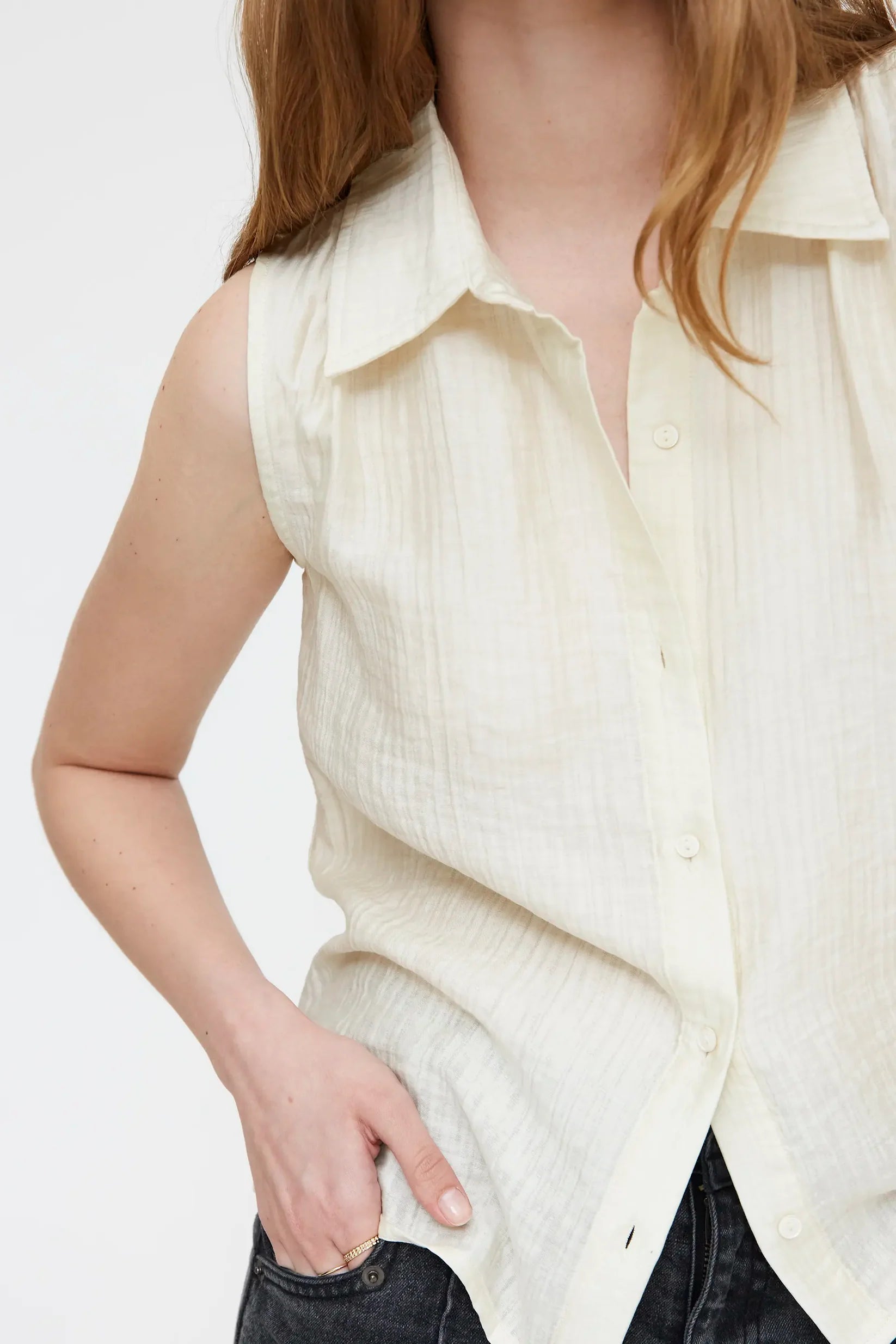 sleeveless blouse in off white