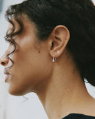 small bean shaped silver drop earring