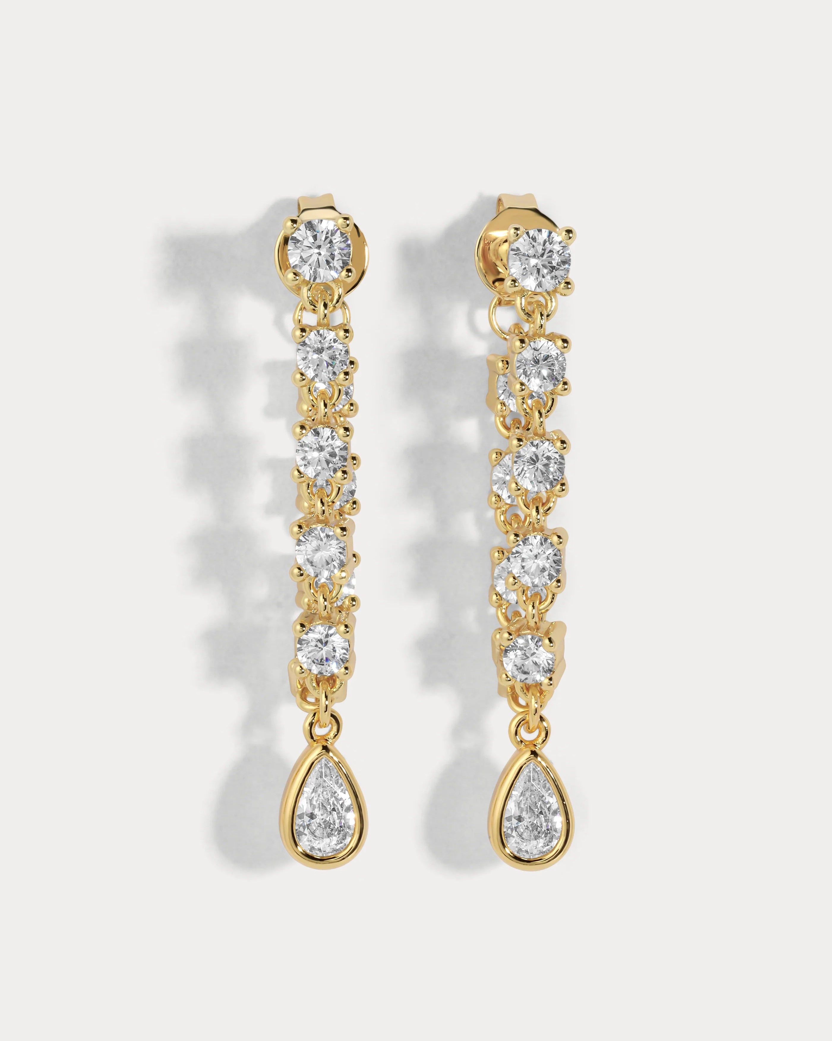 drop diamond earrings in gold