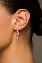 drop diamond earring in silver