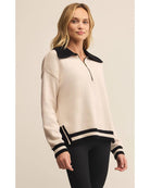 polo sweater with a half zip in cream and black on collar