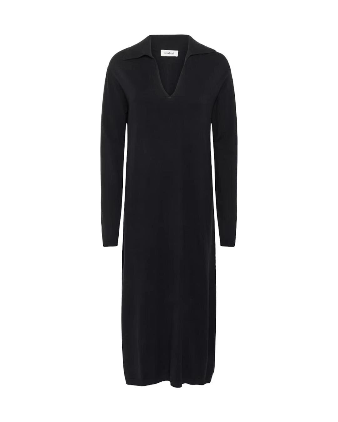 Woman wearing a black knit v neck dress