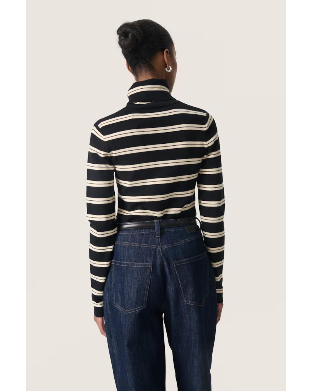 black turtleneck with white stripes