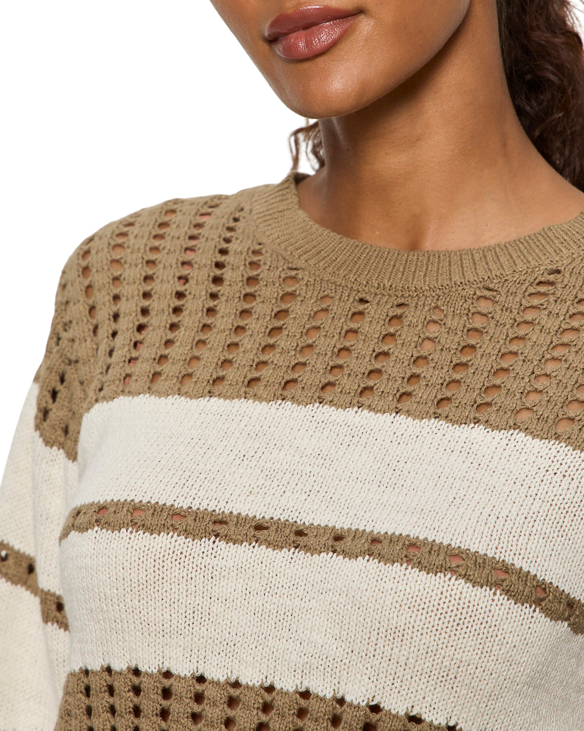 open knit sweater in dark green with a white stripe