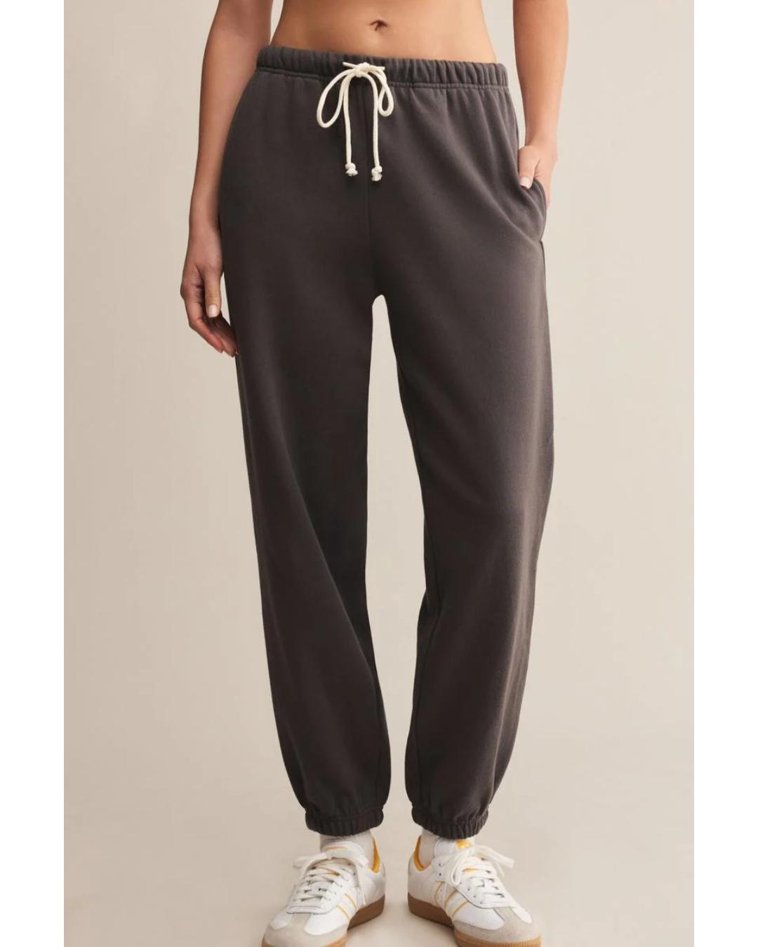 washed black sweatpants with a white rope tie
