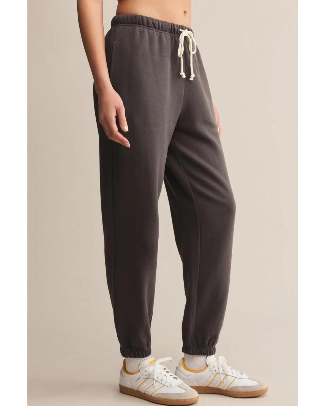 washed black sweatpants with a white rope tie