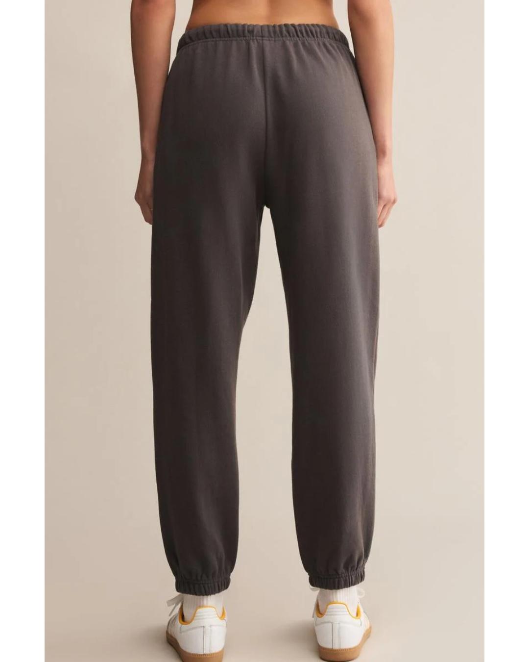 washed black sweatpants with a white rope tie