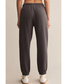 washed black sweatpants with a white rope tie