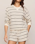 crewneck sweatshirt in cream with black stripes