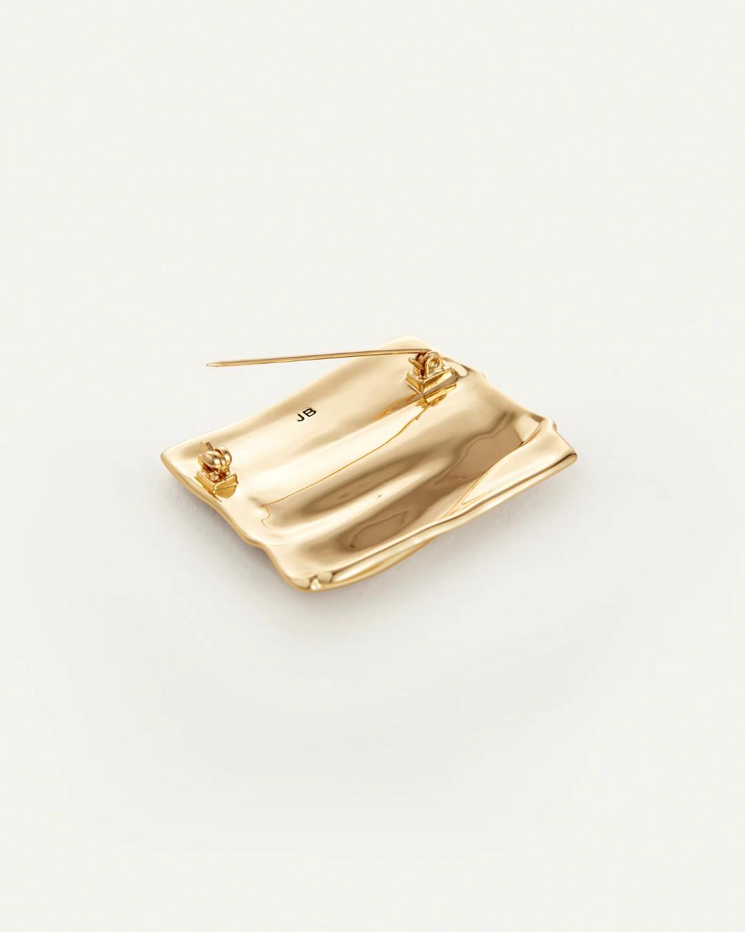 square gold brooch