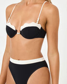 black and cream bikini top in th shape of a shell