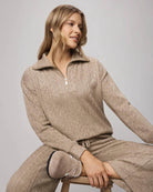 quarter zip sweater in a brown/beige