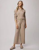 quarter zip sweater in a brown/beige