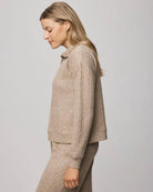 quarter zip sweater in a brown/beige