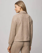quarter zip sweater in a brown/beige
