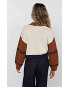 zip sweater with roses on the chest in cream, navy and brown