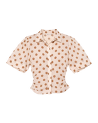 cream blouse with brown polka dots