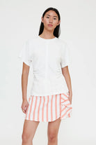 white t-shirt with cinched waist