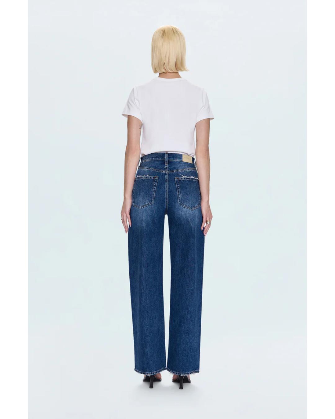 blue denim pants with a bowed leg