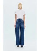 blue denim pants with a bowed leg