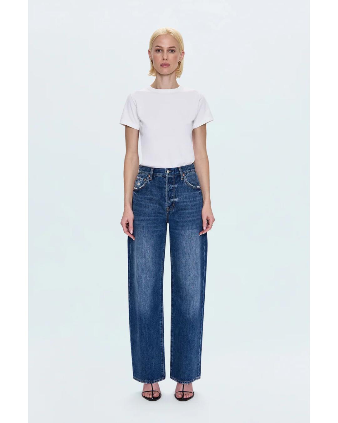 blue denim pants with a bowed leg