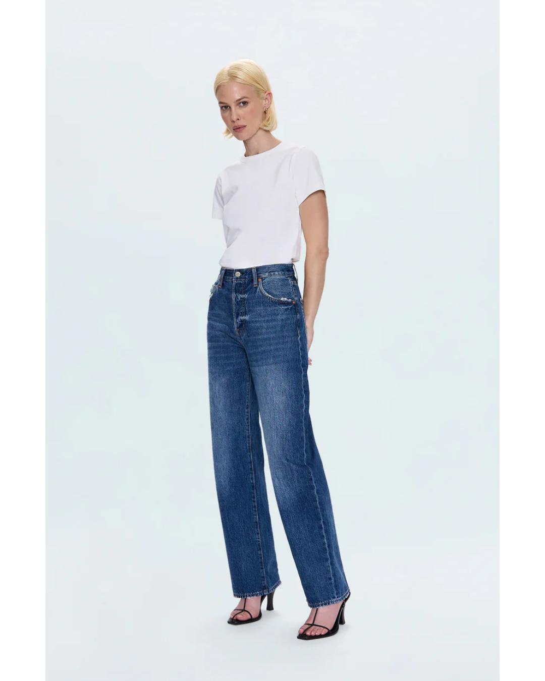 blue denim pants with a bowed leg