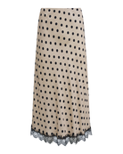 maxi dress in cream with black polka dots and black lace on bottom