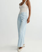 light wash barrel jean with a drawstring