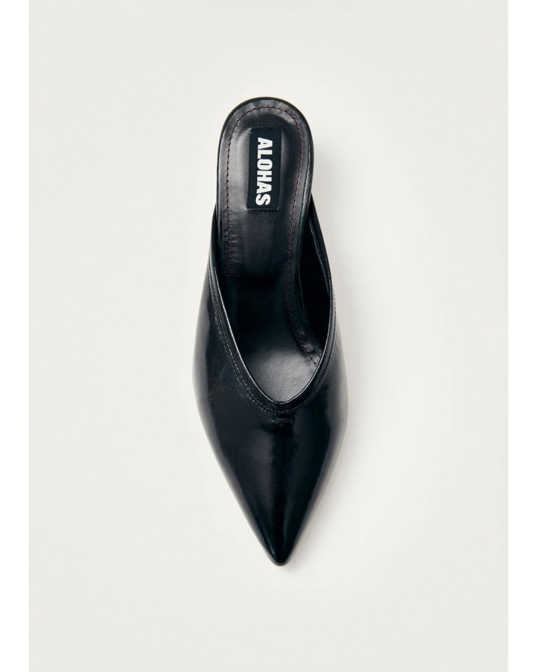 black leather mules with a pointed toe