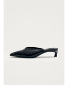 black leather mules with a pointed toe
