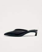 black leather mules with a pointed toe with 'Alohas' logo on them