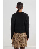 black cardigan with gold buttons