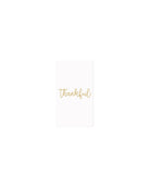 white paper napkins with thankful written in gold