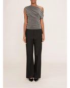 asymmetrical top in a shiny grey