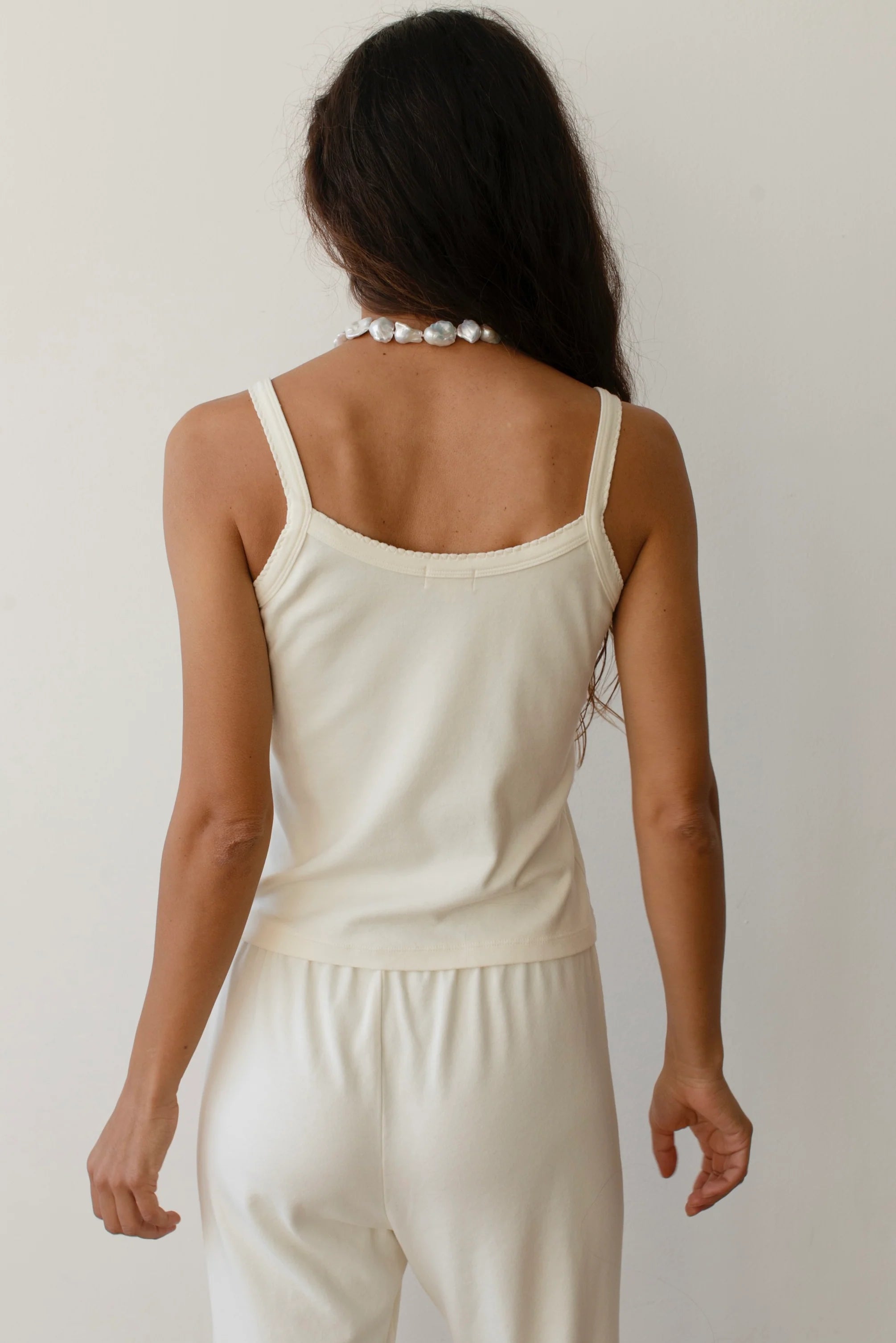 cream tank top with scalloped edges