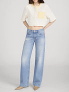 cropped cream top with yellow pocket