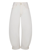 white denim pant with a bubble or curve leg