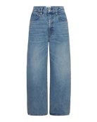 cropped light wash denim pant with a cream crochet detail on the sides 