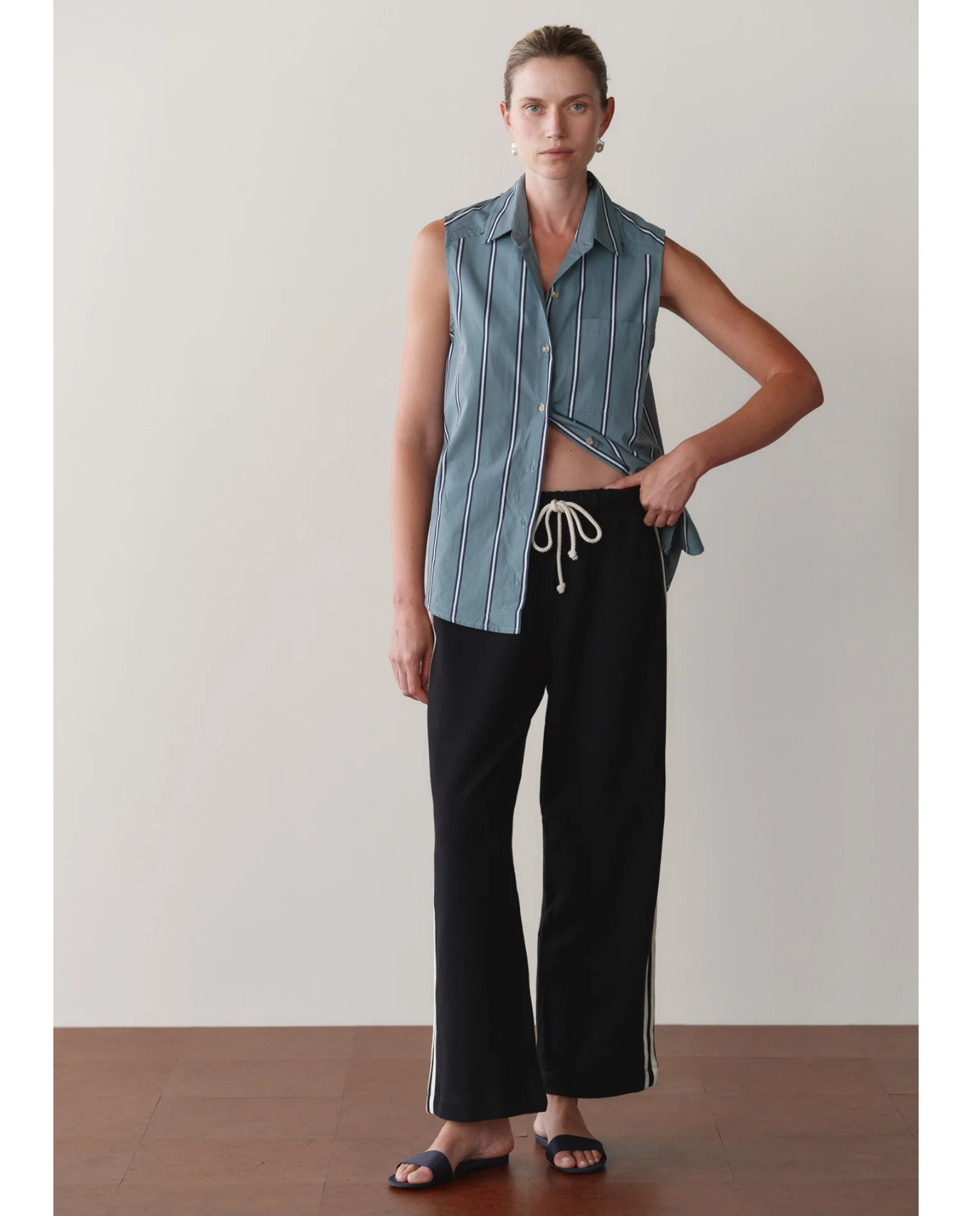 cropped black lounge pant with white stripe down the side