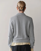 grey polo sweatshirt
