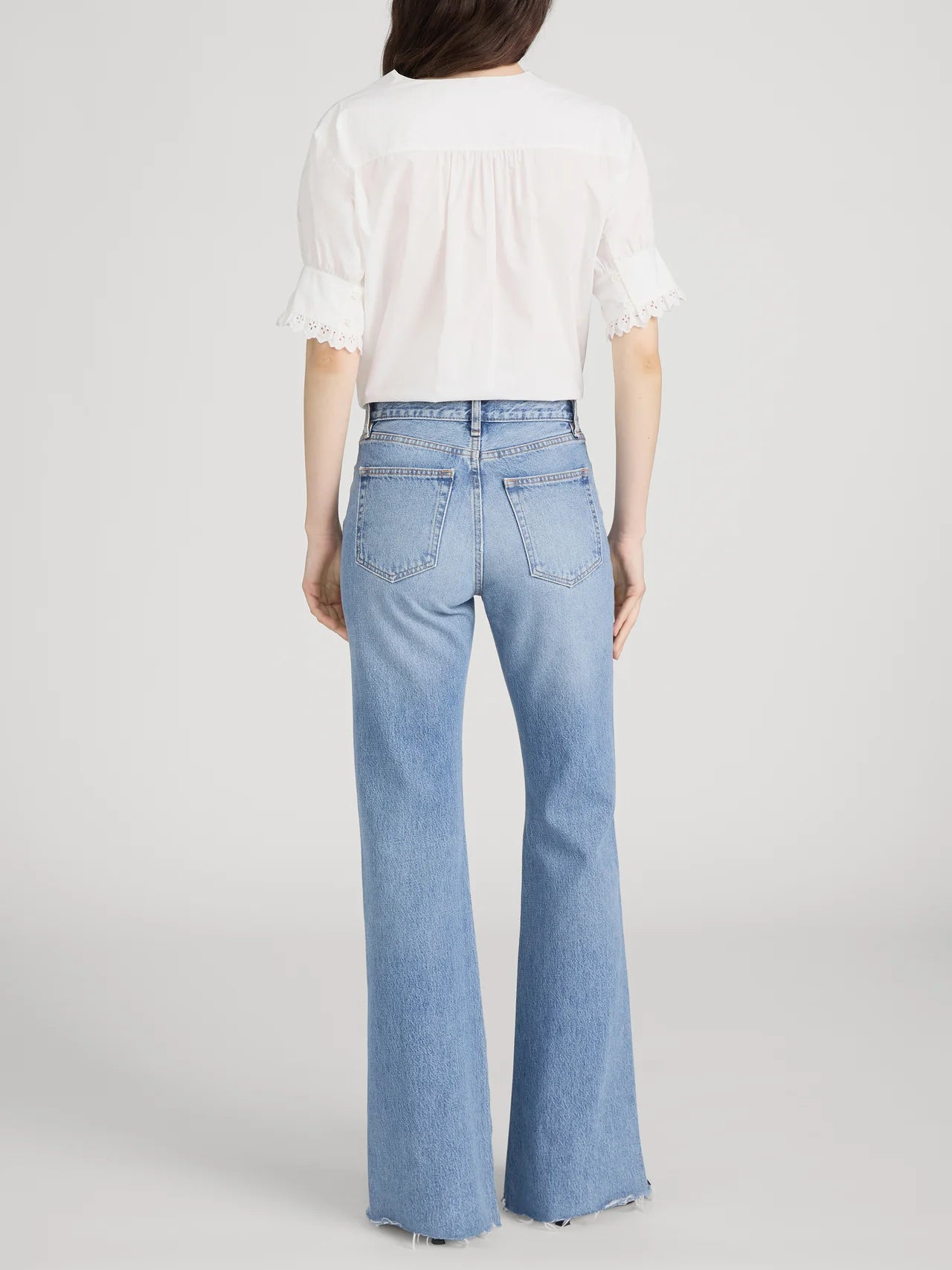 white short sleeve blouse with detail on the sleeves