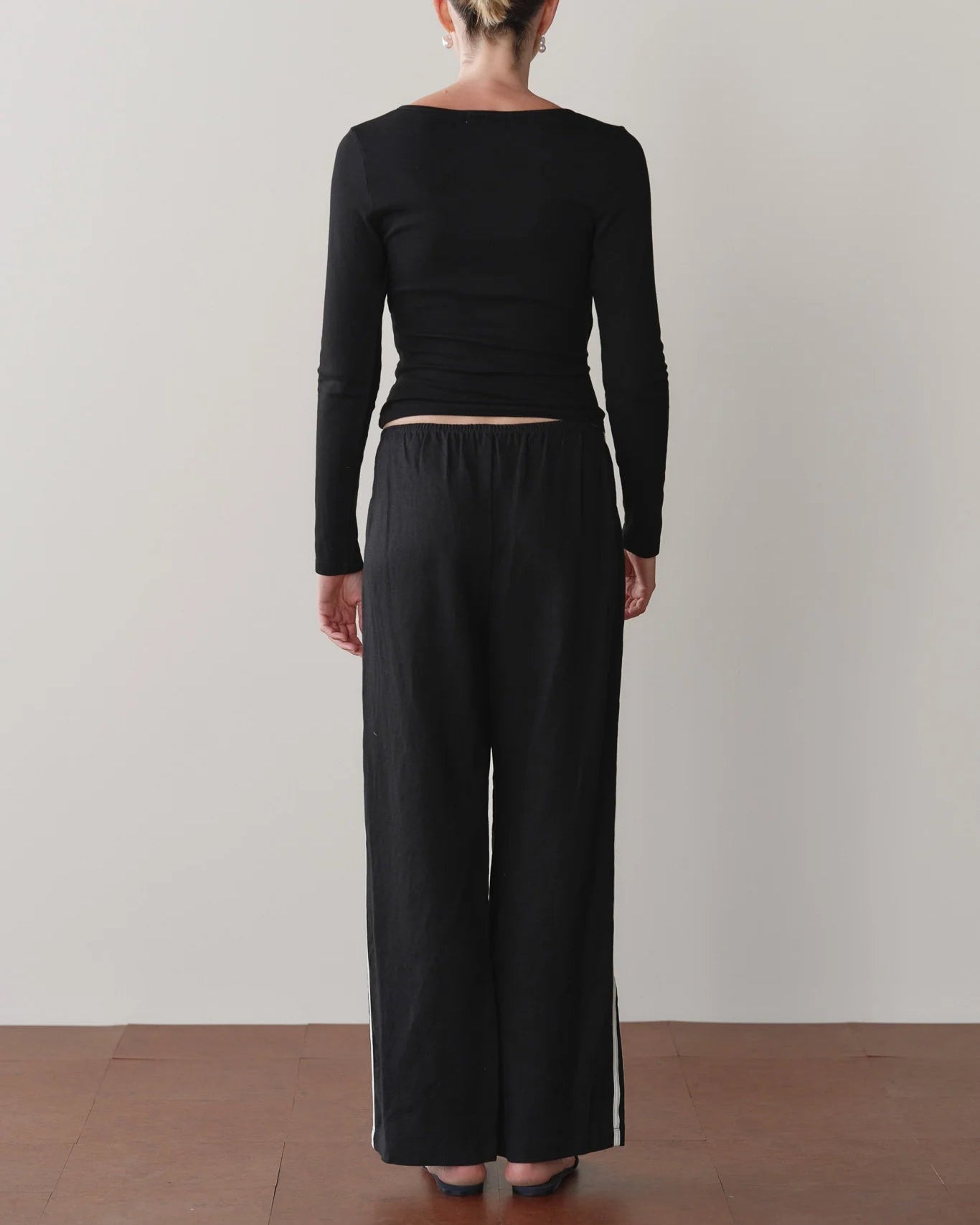 black crop pant with white stripe down the sides