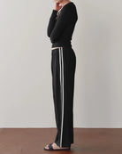 black crop pant with white stripe down the sides