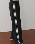 black crop pant with white stripe down the sides