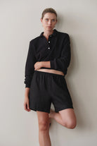 black mid length linen shorts