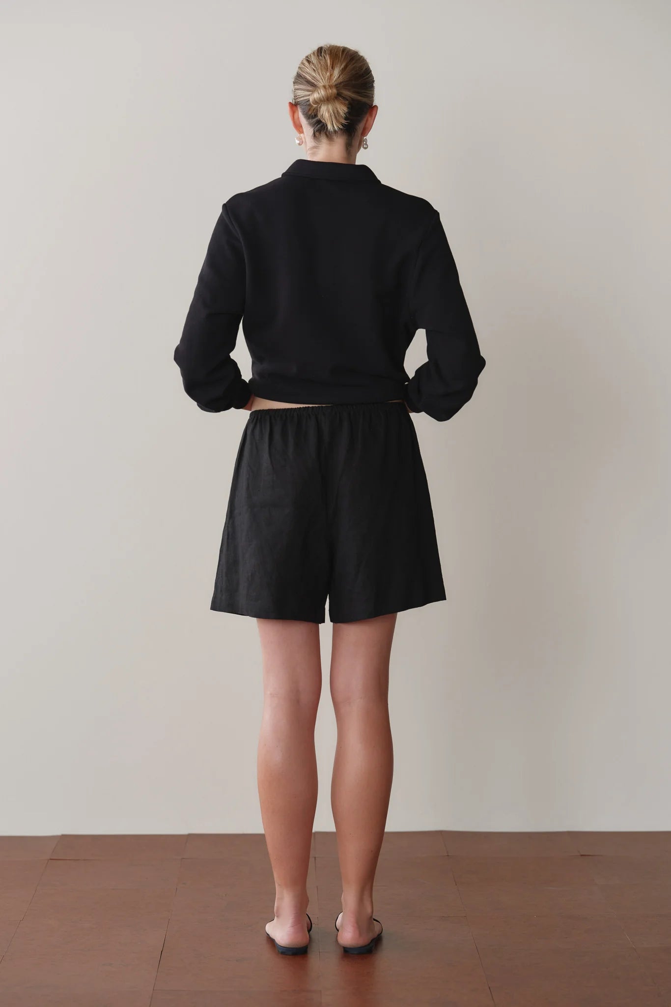 black mid length linen shorts
