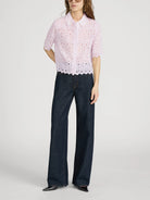 pink short sleeve eyelet blouse